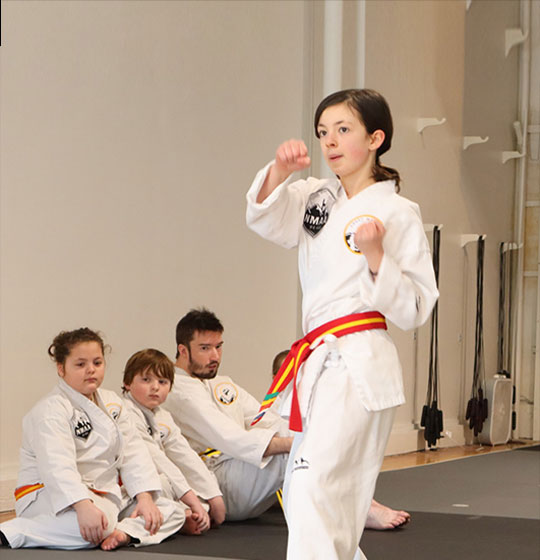 Karate Kids student performing a punch